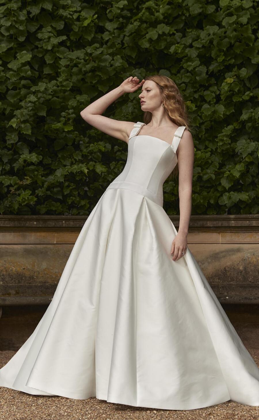 Sassi Holford Aria Drop Waist Ballgown Wedding Dress with Bow Straps worn by Lydia Millen